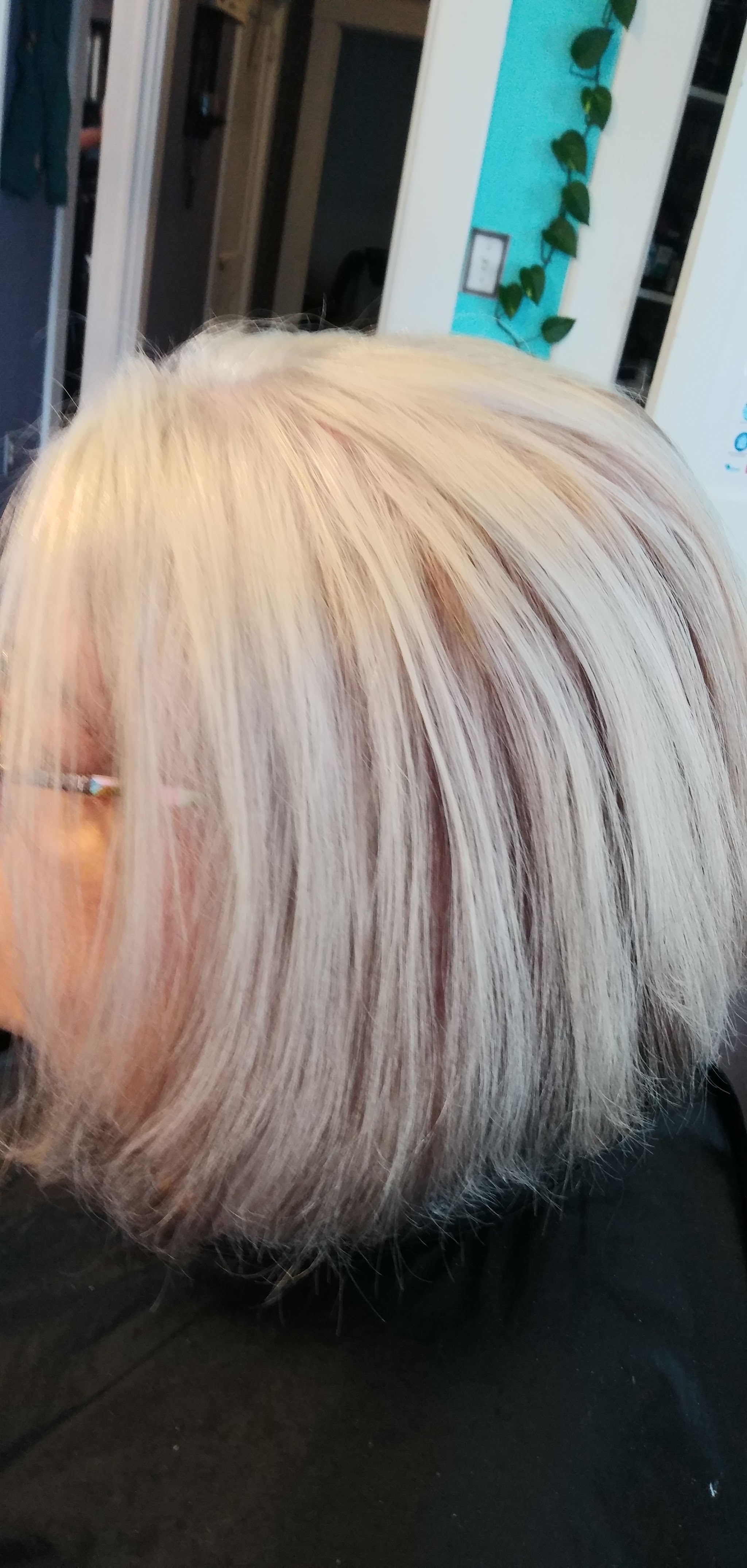 Bright silver-blonde bob with a fringe